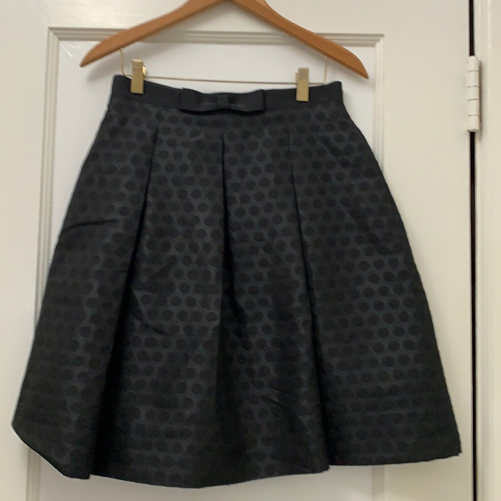 Black polka dot skirt. Red Fleece